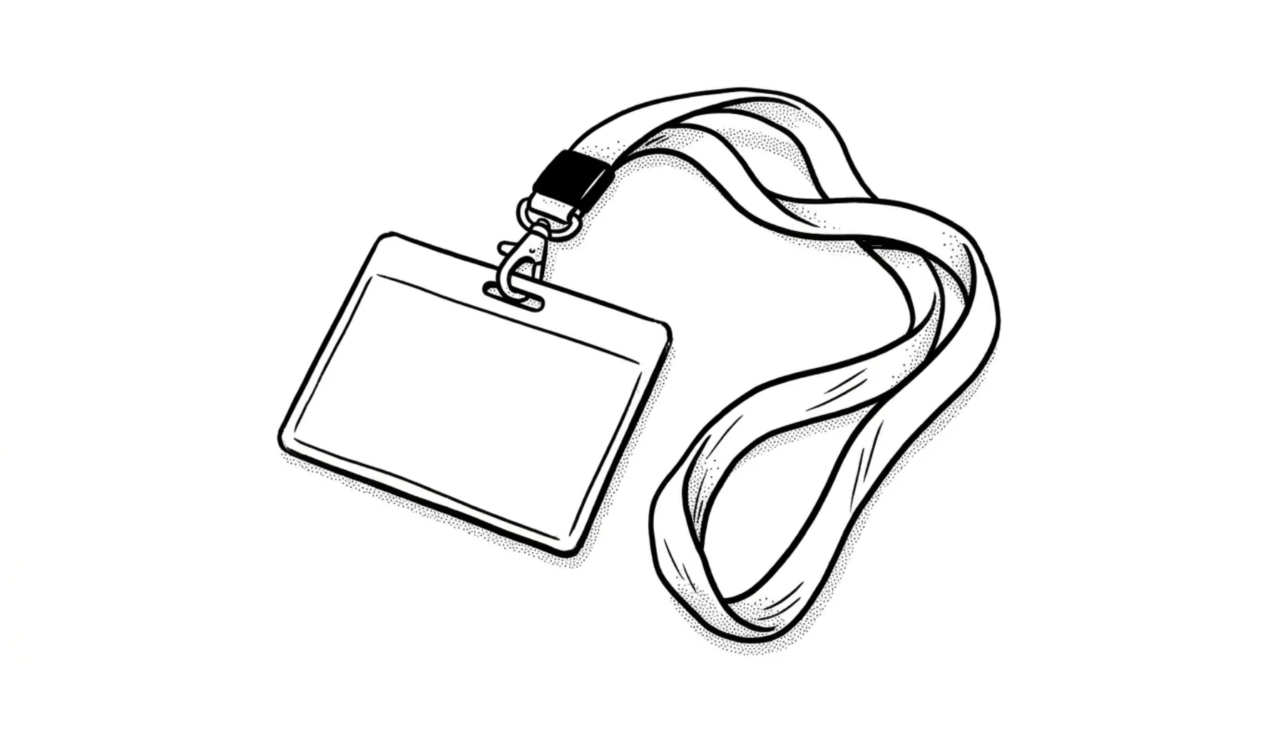 Blank conference name badge attached to a bunched fabric lanyard on a desk